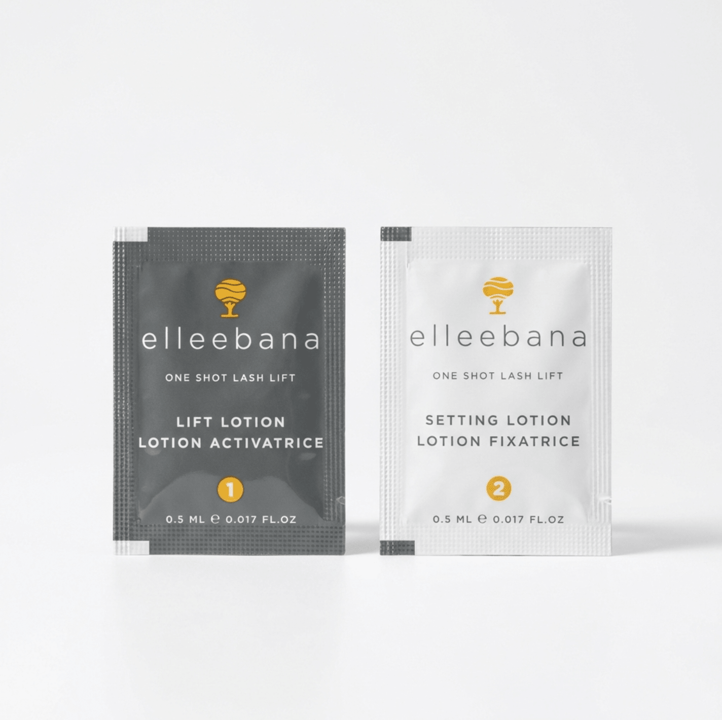 Close-up view of single-use Elleebana One Shot Step 1 Lift lotion and Step 2 Neutraliser setting sachets.